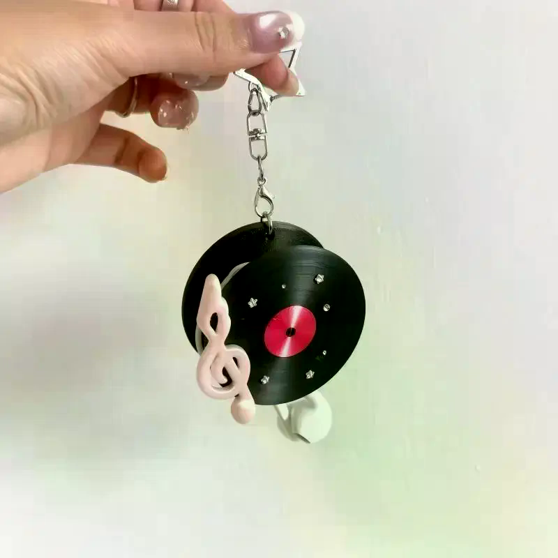 Y2K Vintage Record Shaped Earp - Cable Winder Keychain recension och pris
